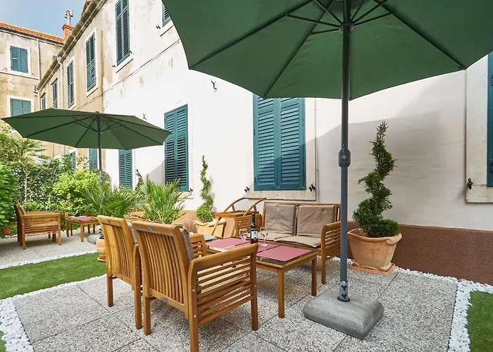With Garden Next To Beach And Old Town